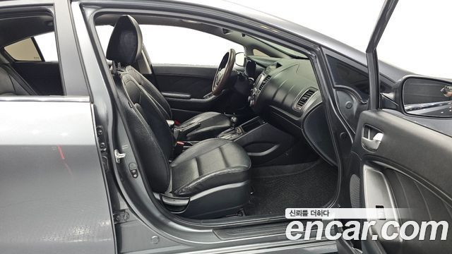 Kia K3 2014 — photo 16