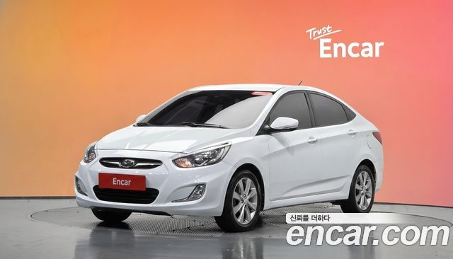 Hyundai Accent 2012 — photo 1
