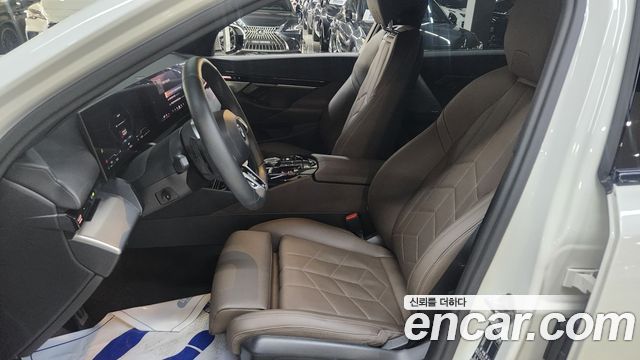 BMW 5-Series 2024 — photo 19