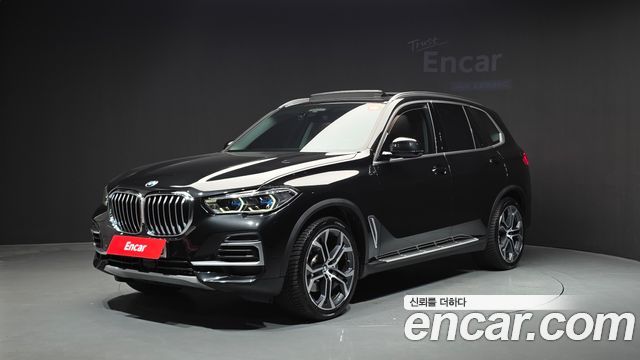 BMW X5 2022 — photo 1