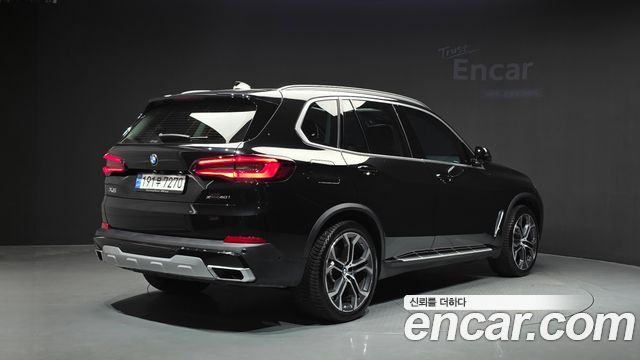 BMW X5 2022 — photo 2