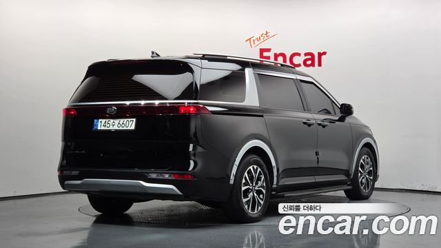 Kia Canival 2021 — photo 2