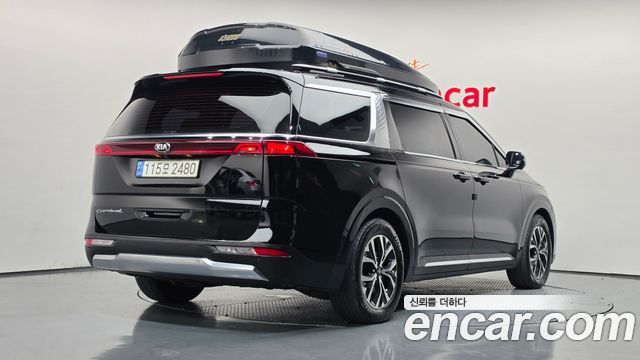Kia Canival 2021 — photo 2