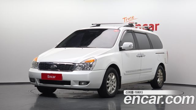Kia Canival 2012 — photo 1