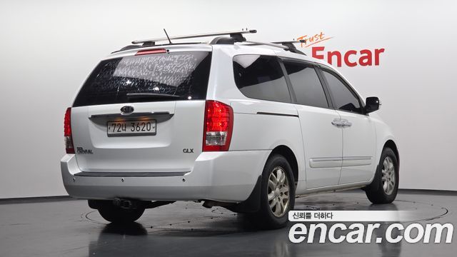 Kia Canival 2012 — photo 2