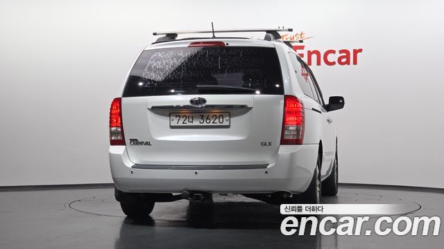 Kia Canival 2012 — photo 4