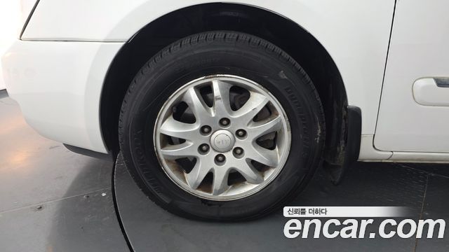 Kia Canival 2012 — photo 5