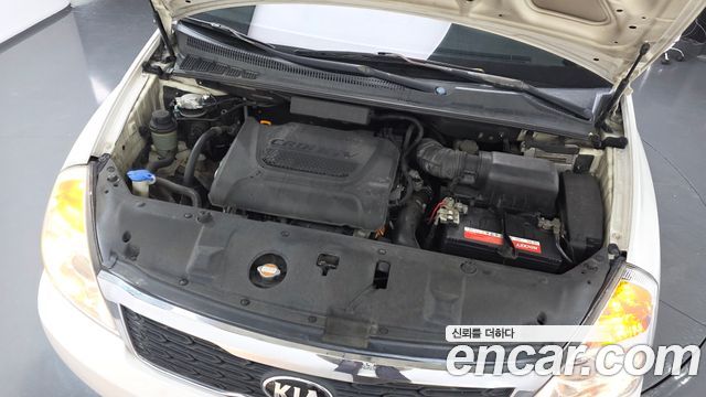 Kia Canival 2012 — photo 6