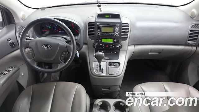 Kia Canival 2012 — photo 7