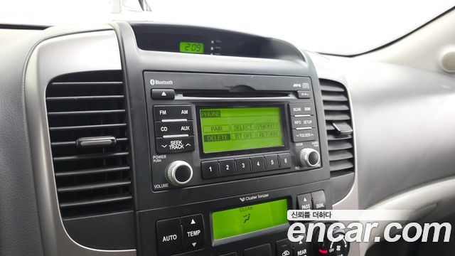 Kia Canival 2012 — photo 12