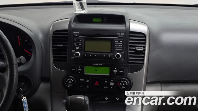 Kia Canival 2012 — photo 14