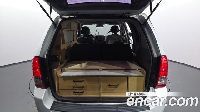 Kia Canival 2012 — photo 20