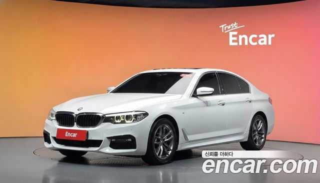 BMW 5-Series 2018 — photo 1