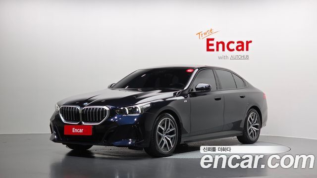 BMW 5-Series 2024 — photo 1