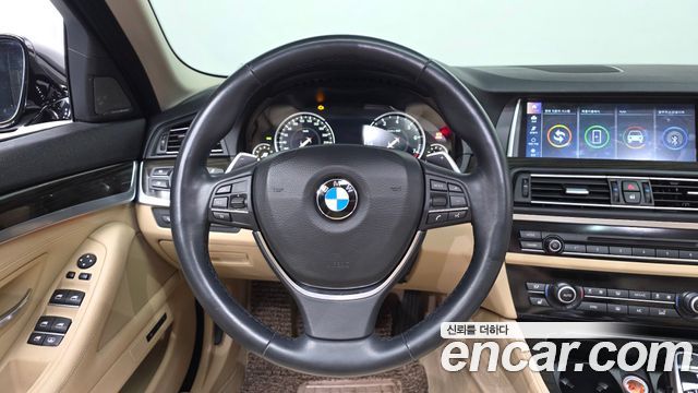 BMW 5-Series 2015 — photo 19