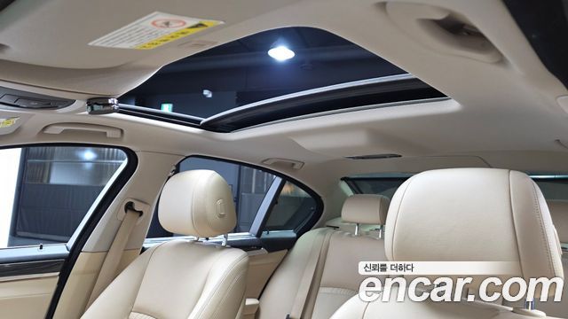 BMW 5-Series 2015 — photo 25