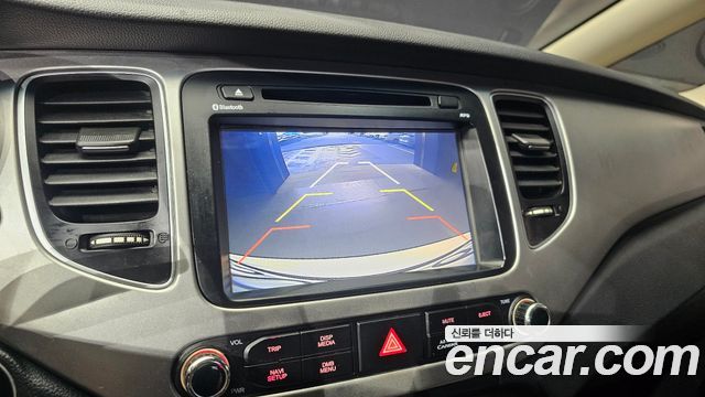 Kia Carens 2015 — photo 21