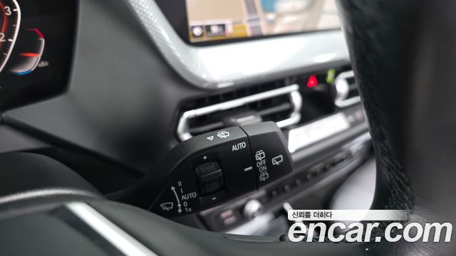 BMW 1-Series 2022 — photo 24