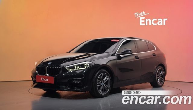 BMW 1-Series 2022 — photo 1