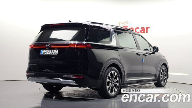 Kia Canival 2021 — photo 2