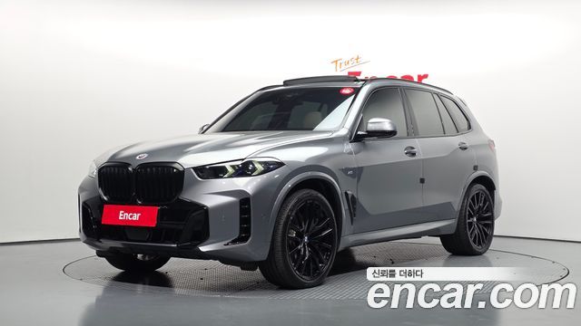 BMW X5 2024 — photo 1