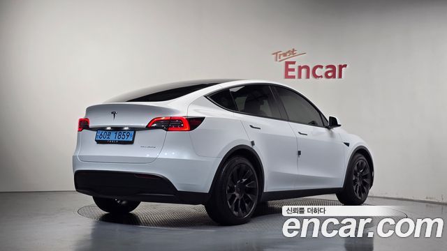 Tesla Model Y 2022 — photo 2