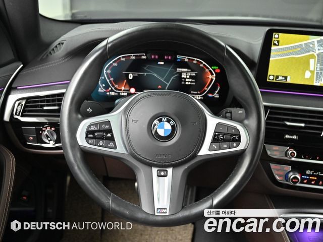 BMW 5-Series 2023 — photo 13