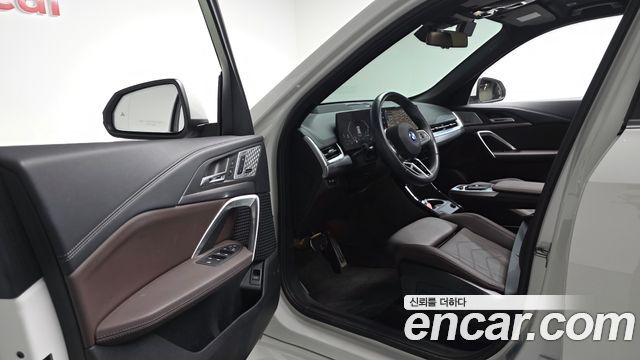 BMW iX1 2024 — photo 13
