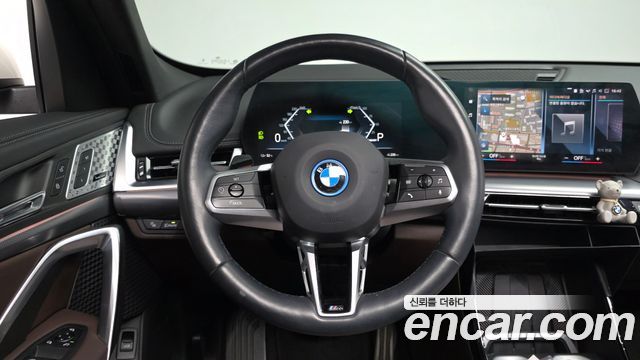 BMW iX1 2024 — photo 19