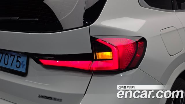 BMW iX1 2024 — photo 9