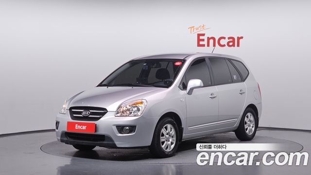 Kia Carens 2010 — photo 1