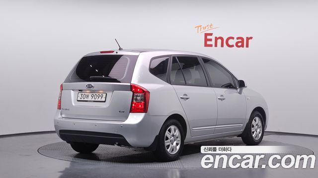 Kia Carens 2010 — photo 2