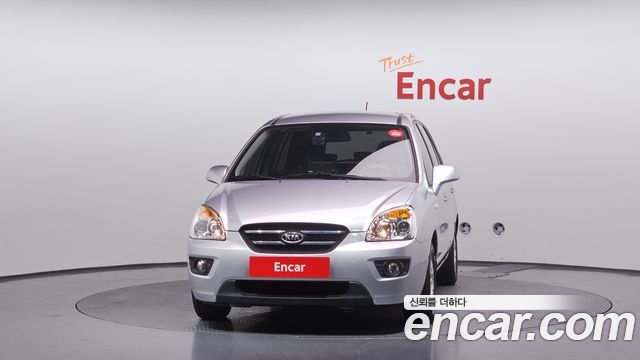 Kia Carens 2010 — photo 3
