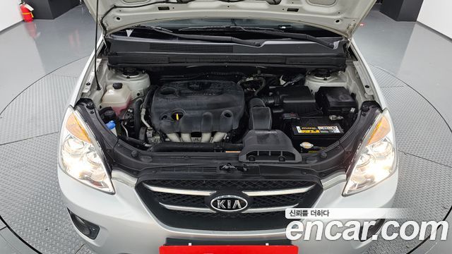 Kia Carens 2010 — photo 6