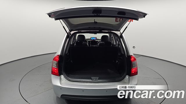 Kia Carens 2010 — photo 20