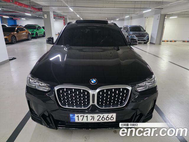 BMW X4 2023 — photo 1