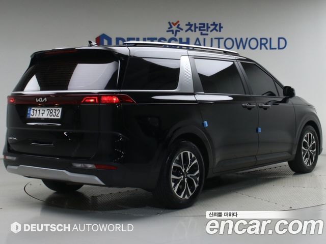 Kia Canival 2023 — photo 2