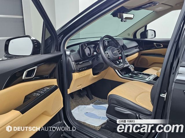 Kia Canival 2023 — photo 11
