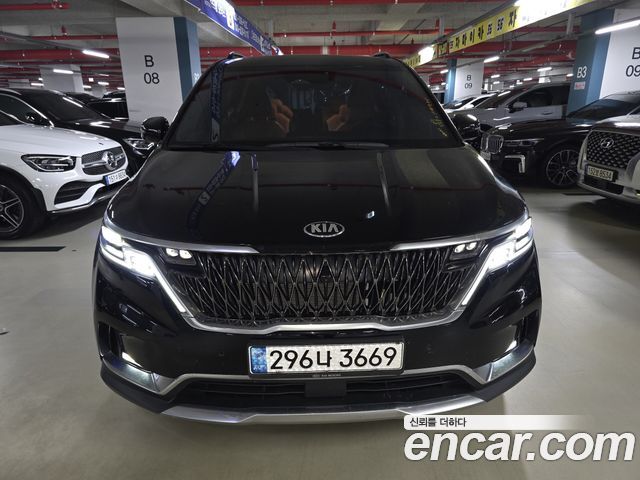 Kia Canival 2021 — photo 2