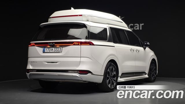 Kia Canival 2023 — photo 2