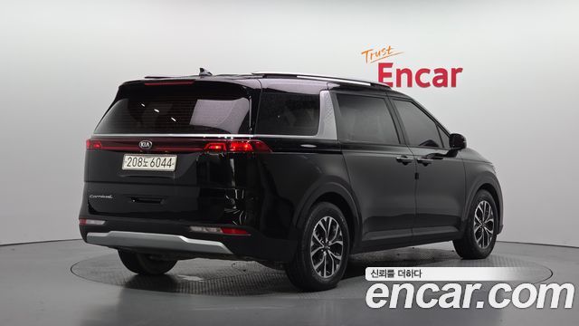 Kia Canival 2021 — photo 2