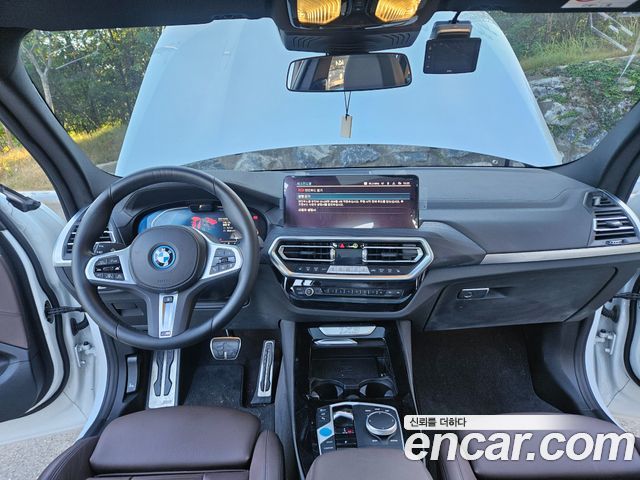 BMW iX3 2023 — photo 10