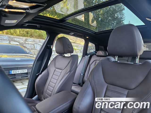 BMW iX3 2023 — photo 18