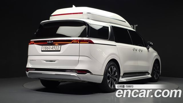 Kia Canival 2023 — photo 2