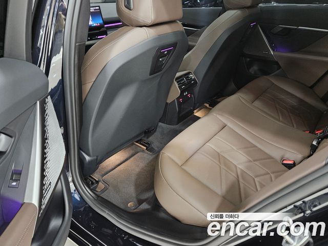 BMW 5-Series 2024 — photo 11