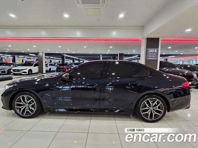 BMW 5-Series 2024 — photo 20