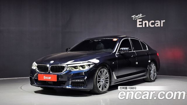 BMW 5-Series 2019 — photo 1