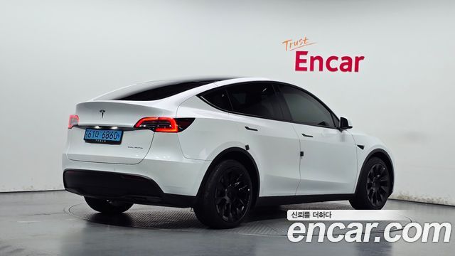 Tesla Model Y 2022 — photo 2