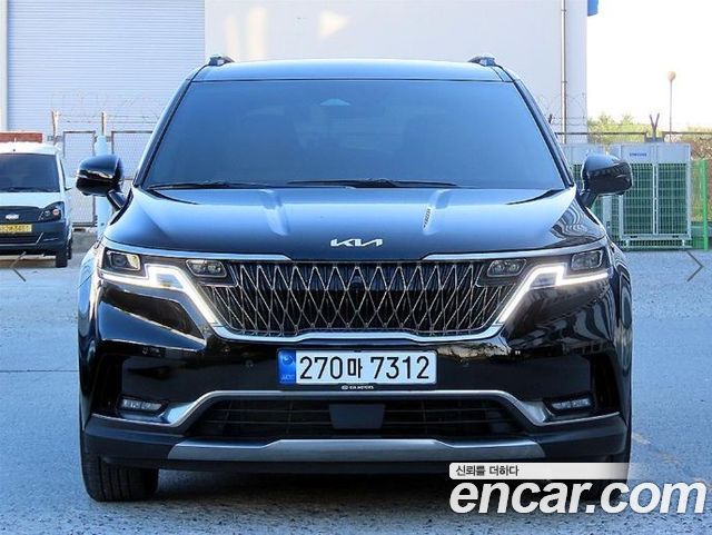 Kia Canival 2023 — photo 1