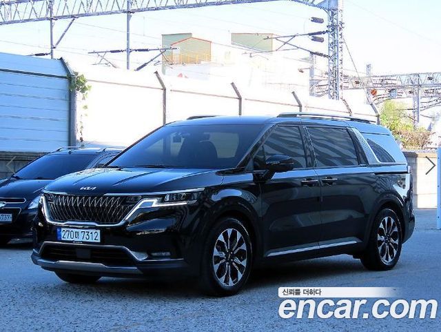 Kia Canival 2023 — photo 2